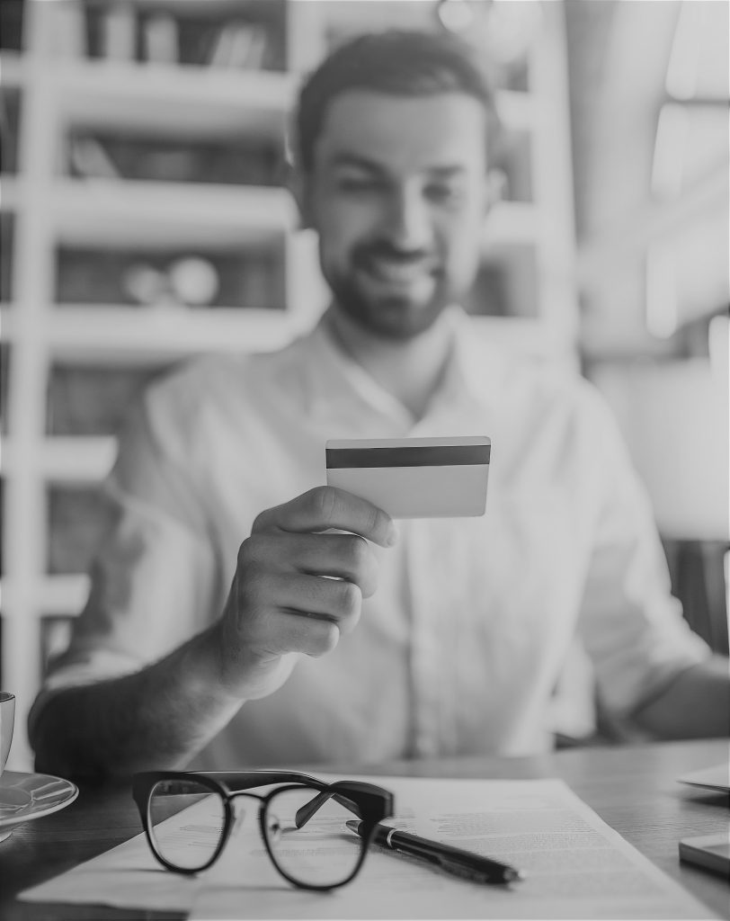 man working with credit card
