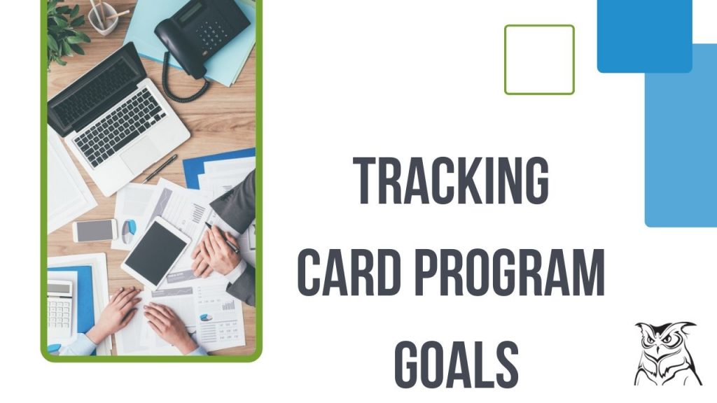 Business managers tracking card program goals at computer